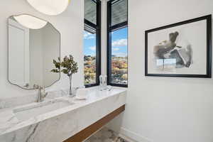 Bathroom with baseboards and vanity