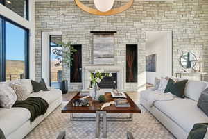 Living room featuring wood finished floors and a fireplace