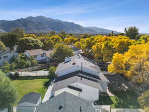 Aerial view of residential area featuring mountains