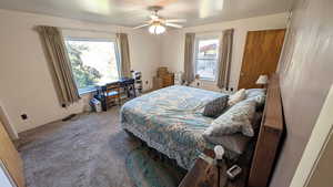 Bedroom featuring carpet and ceiling fan