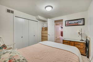 Bedroom featuring a closet