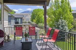 Wooden terrace with a mountain view and grilling area