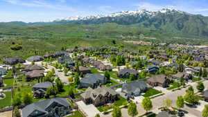 Aerial view of residential area with a mountainous background