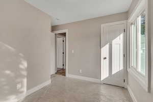 Spare room featuring plenty of natural light