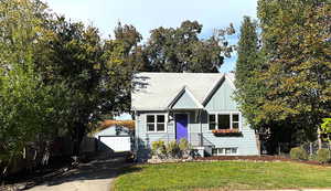 View of front of property with a garage