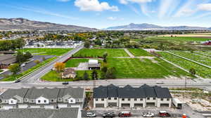 Aerial view of residential area with a mountainous background