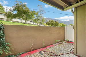 View of patio featuring a mountain view