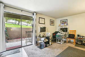 Office area featuring a textured ceiling