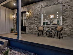 Wine room featuring recessed lighting and wood ceiling