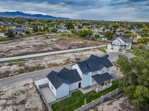 Aerial perspective of suburban area featuring mountains