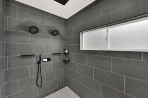 Bathroom with tiled shower