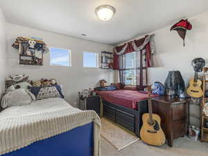 View of carpeted bedroom