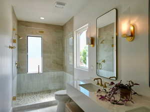 Full bath with a stall shower, vanity, tile patterned flooring, and recessed lighting