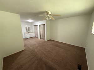 Primary room/walls are white but sun is casting a yellow glow