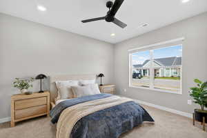 Bedroom with carpet, a ceiling fan, and recessed lighting