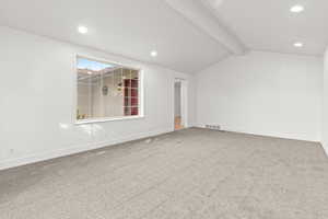 Unfurnished room featuring light colored carpet and recessed lighting