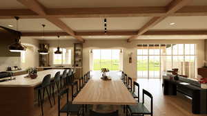 Dining space featuring coffered beam ceiling, tons of natural light, and wood-style flooring
