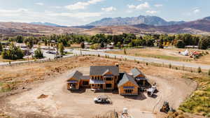 Aerial view of home with view Snowbasin Ski Resort