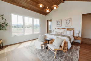 Primary Suite on main level featuring wood ceiling