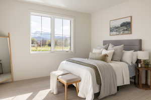 Large window with grid patterns showcasing mountain scenery