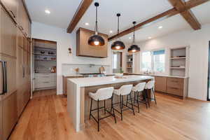 Chefs kitchen with oversized butlers pantry