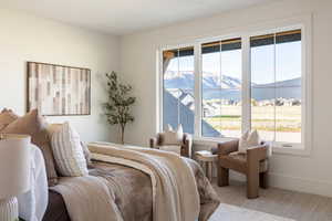 Upstairs Bedroom #1 with expansive window wall with mountain backdrop