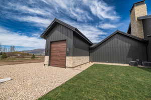 View of outbuilding featuring a mountain view