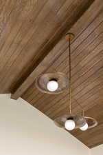 Tongue & groove wood ceiling & unique light fixutre