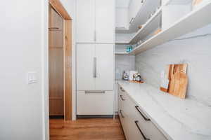 2nd fridge, ample counterspace and cabinets for storage