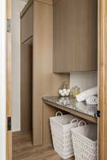 Main level laundry for stackable W/D with countertop & cabinetry