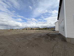 View of yard featuring a mountain view