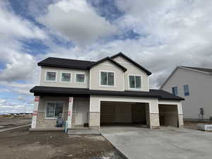 Craftsman-style house featuring stone siding, concrete driveway, an attached garage, roof with shingles, and covered porch