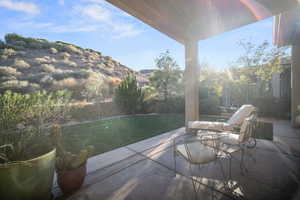 View of patio / terrace with a mountain view