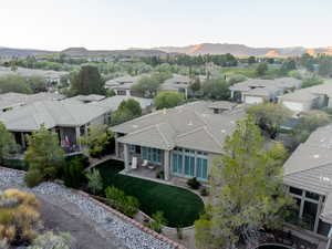 Aerial perspective of suburban area featuring a mountainous background