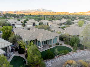 Aerial perspective of suburban area featuring a mountainous background