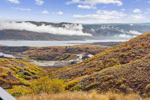 View of mountain background featuring a nearby body of water