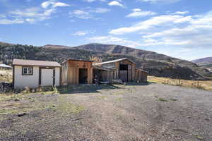 View of shed with a mountain view