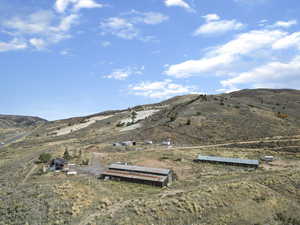 View of mountain background featuring rural landscape