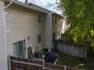 Rear view of property featuring a patio area