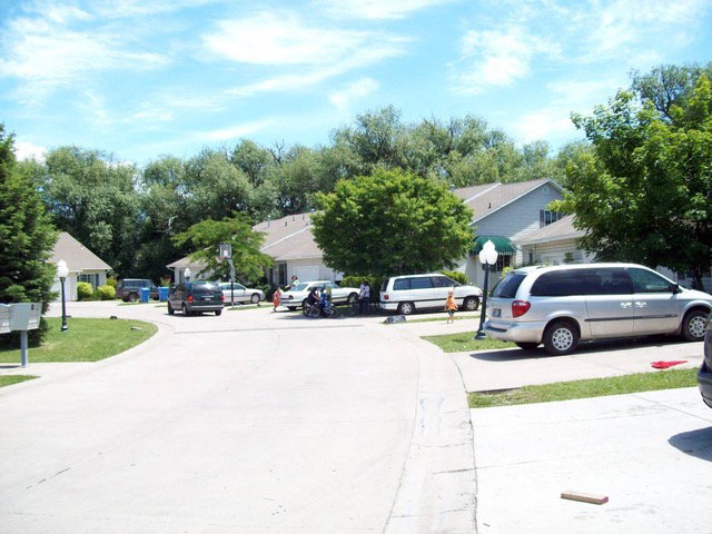 View of concrete street with a residential view