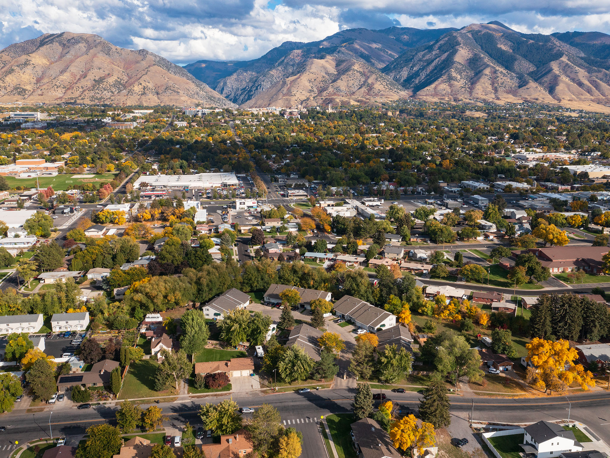 View of property location with a mountainous background and nearby suburban area