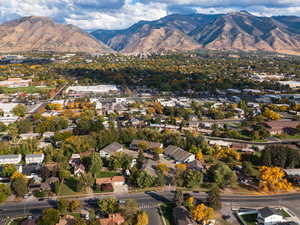 View of property location with a mountainous background and nearby suburban area