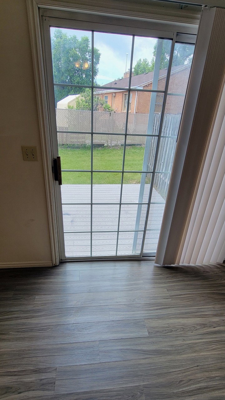 Doorway with wood finished floors