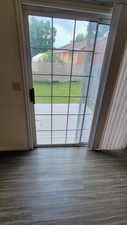 Doorway with wood finished floors