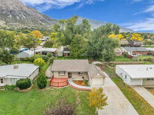Aerial view of residential area with a mountainous background
