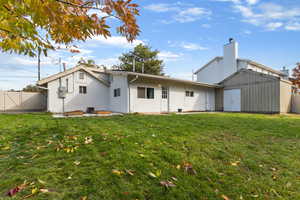 Back of house with stucco siding