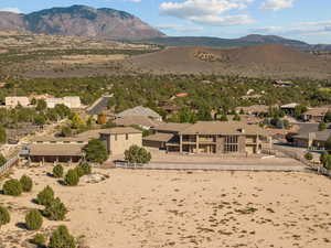 View of mountain backdrop featuring nearby suburban area