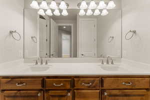 Full bathroom featuring double vanity