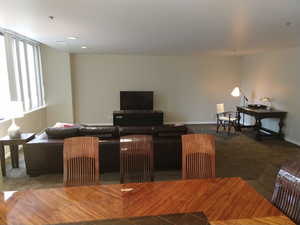 Dining space featuring carpet floors and recessed lighting