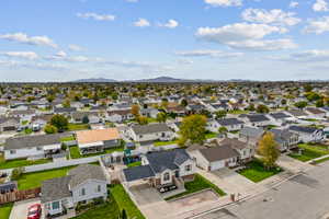 Aerial view of residential area with mountains